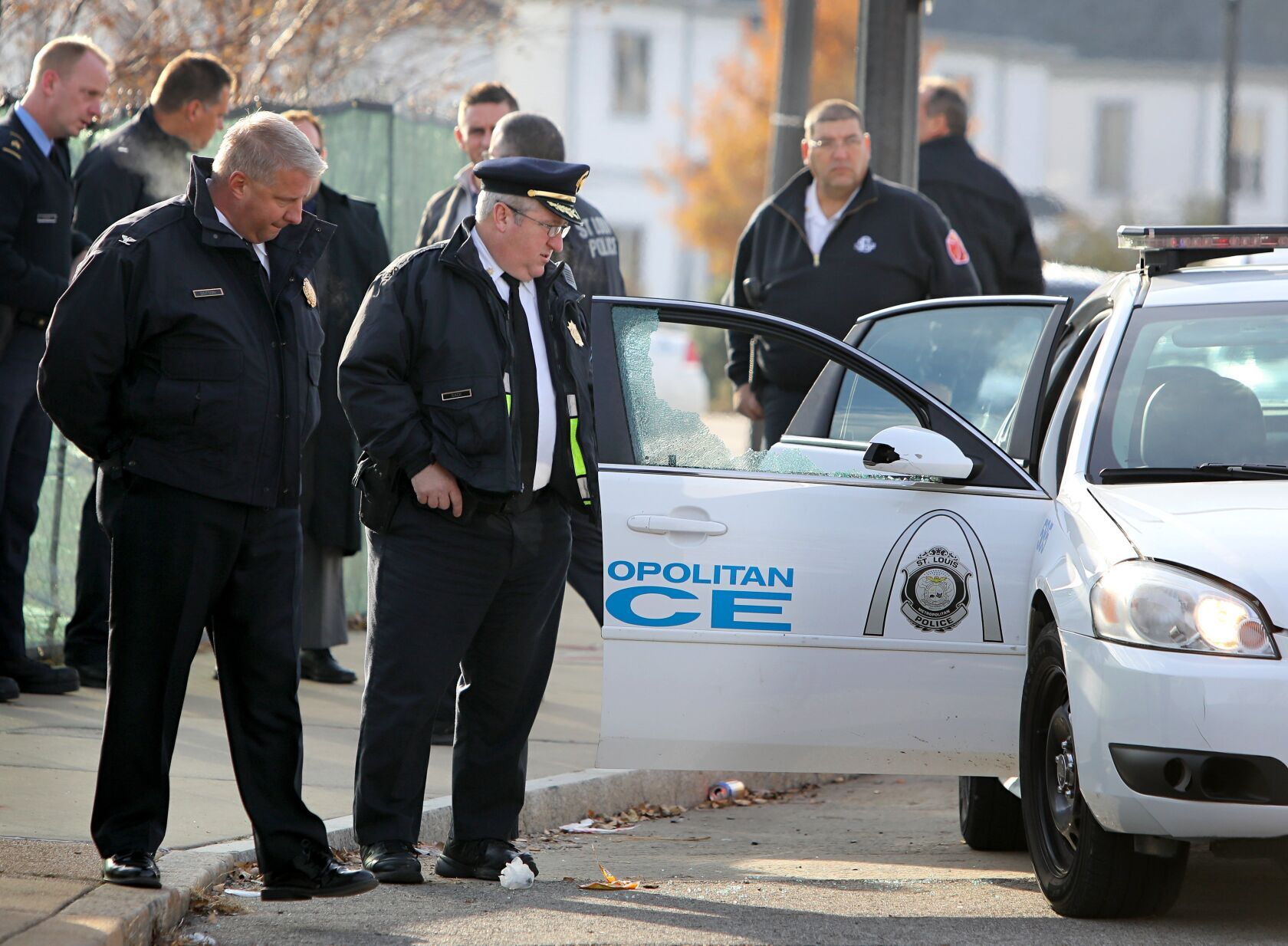 Police fire shot at suspect in stolen car who drove at them